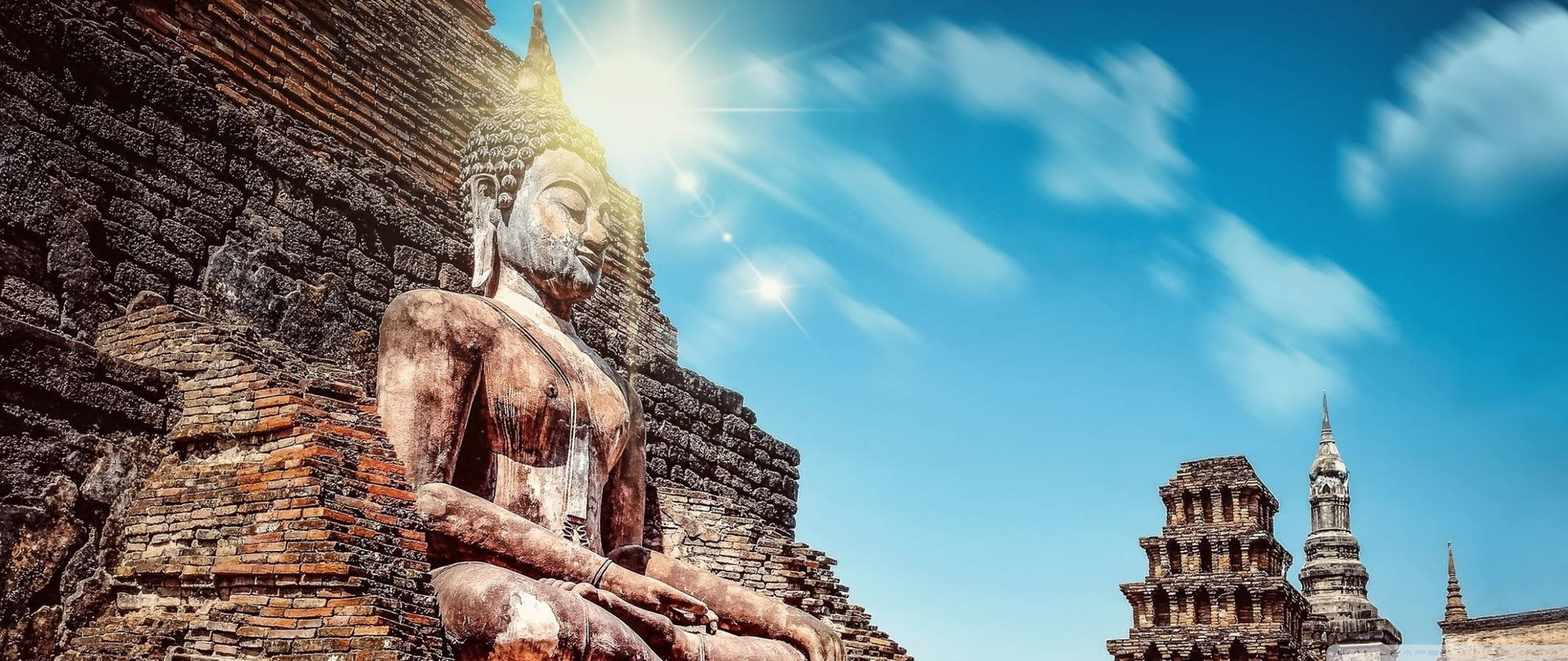 Buddha Statue Under Sun Background