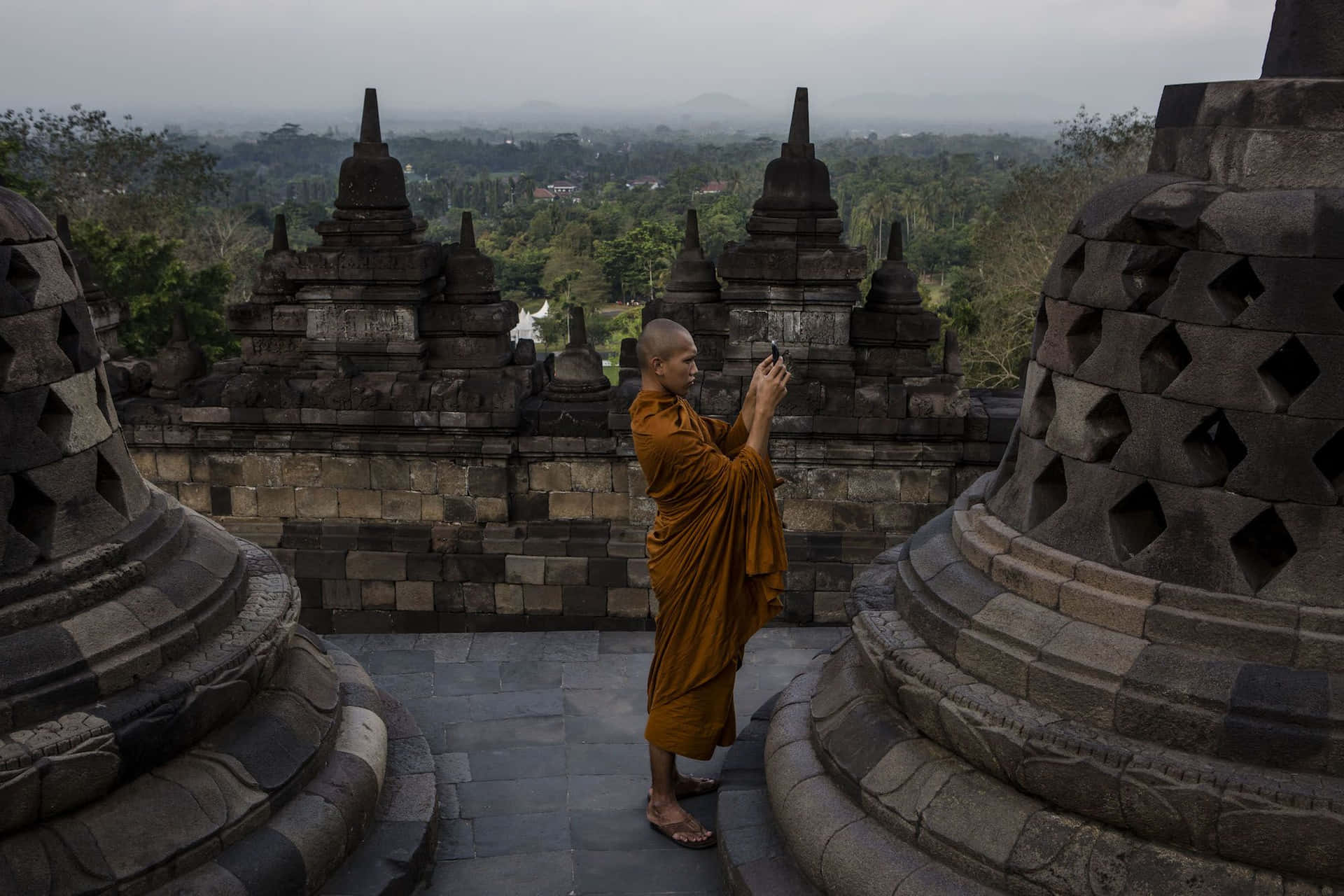 Buddhist Monk In Borobudur Temple Background