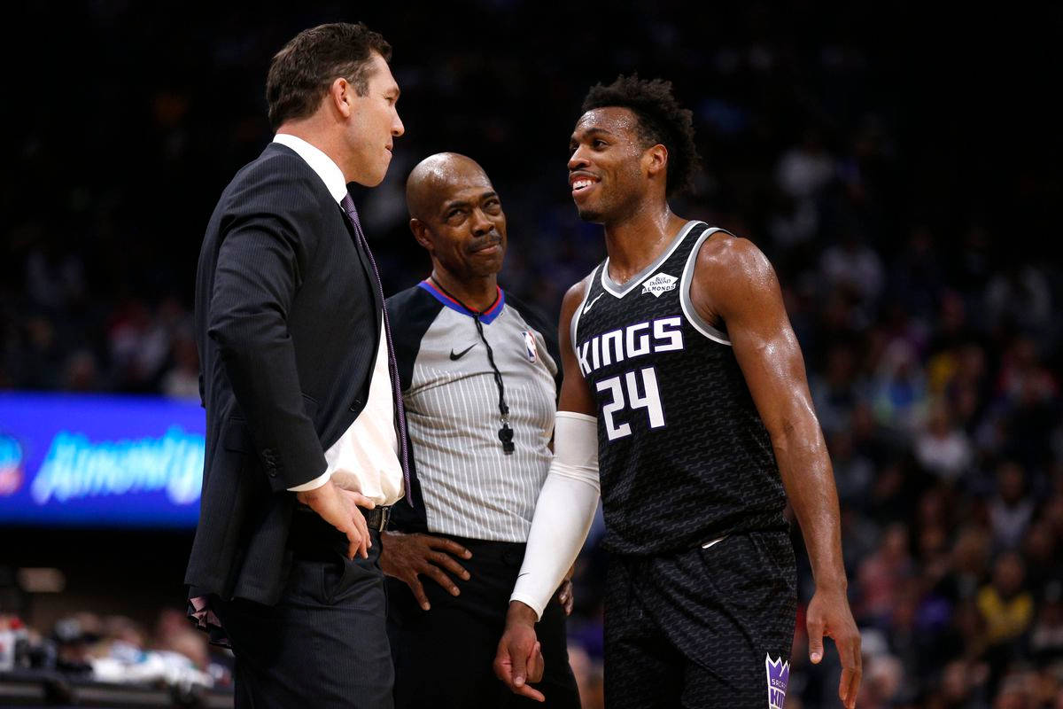 Buddy Hield With Coach And Referee Background