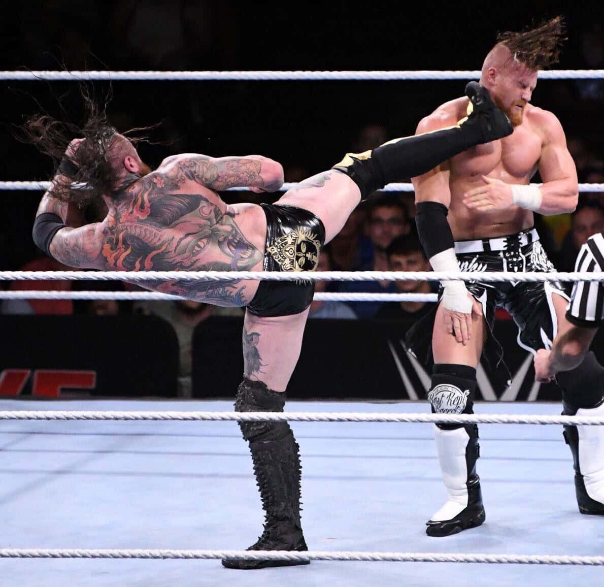 Buddy Murphy Kicked By Aleister Black Wwe Tlc 2019 Background