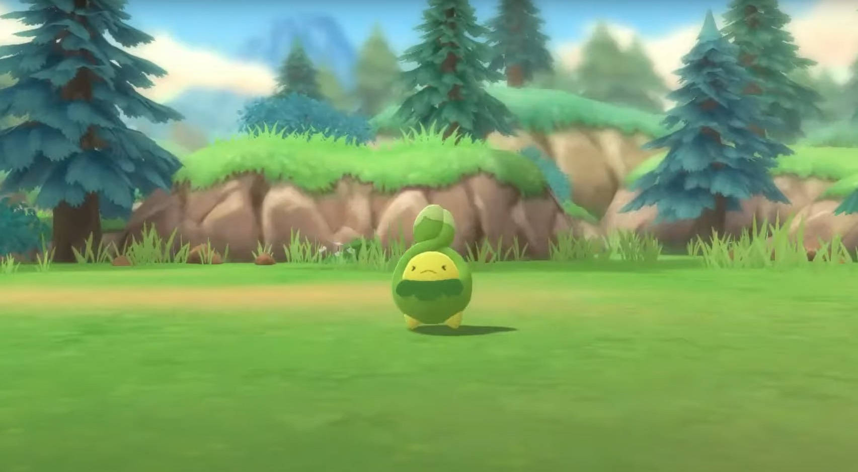 Budew In The Middle Of Grass Field Background