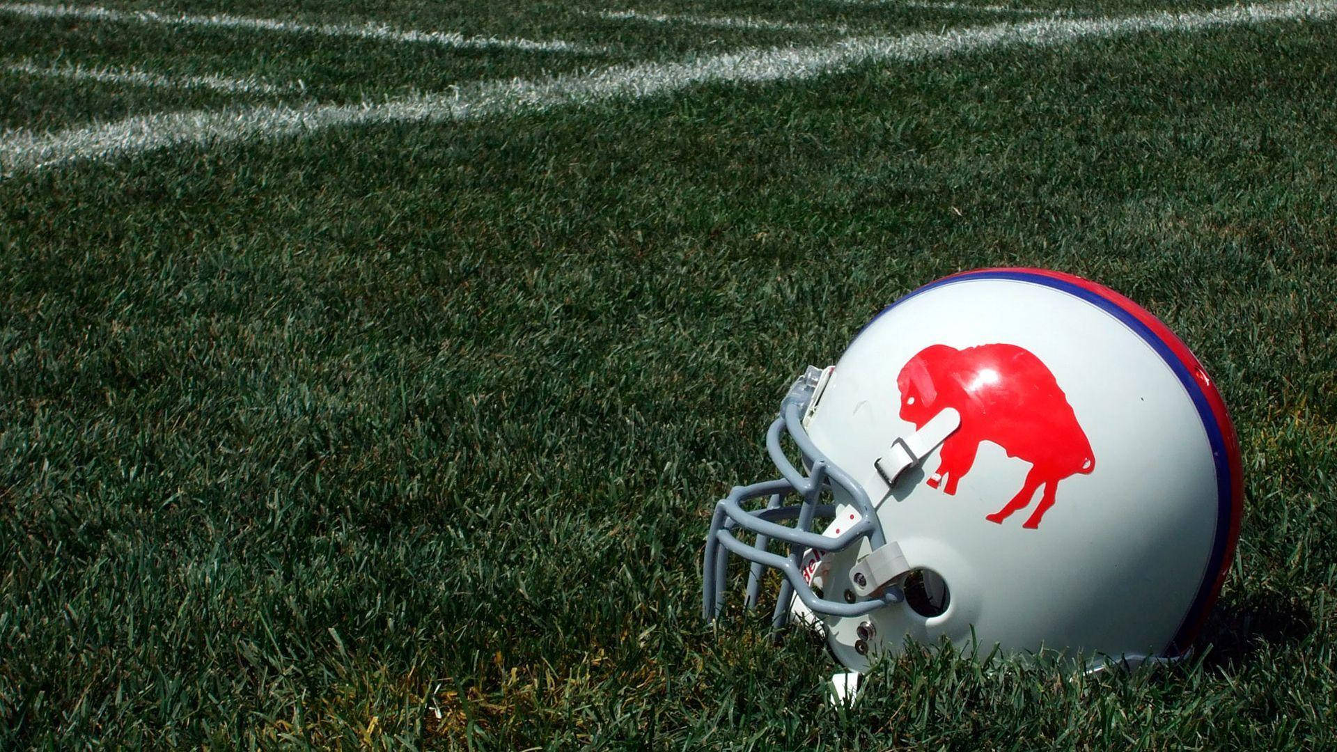 Buffalo Bills Helmet On Field Background