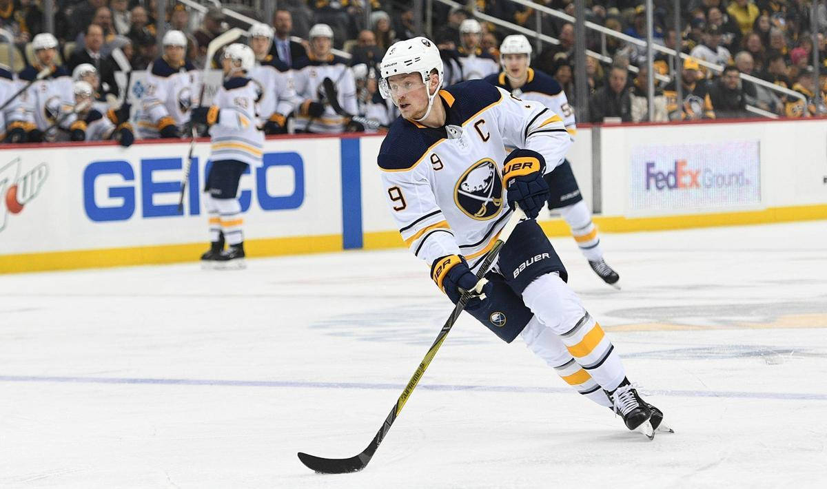 Buffalo Sabres' Star Player Jack Eichel In Action Background