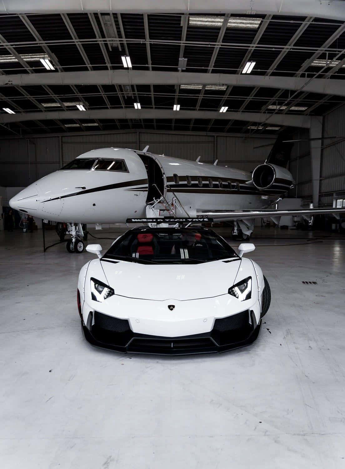 Bugatti Divo Driving Between Two Fighter Jets Background