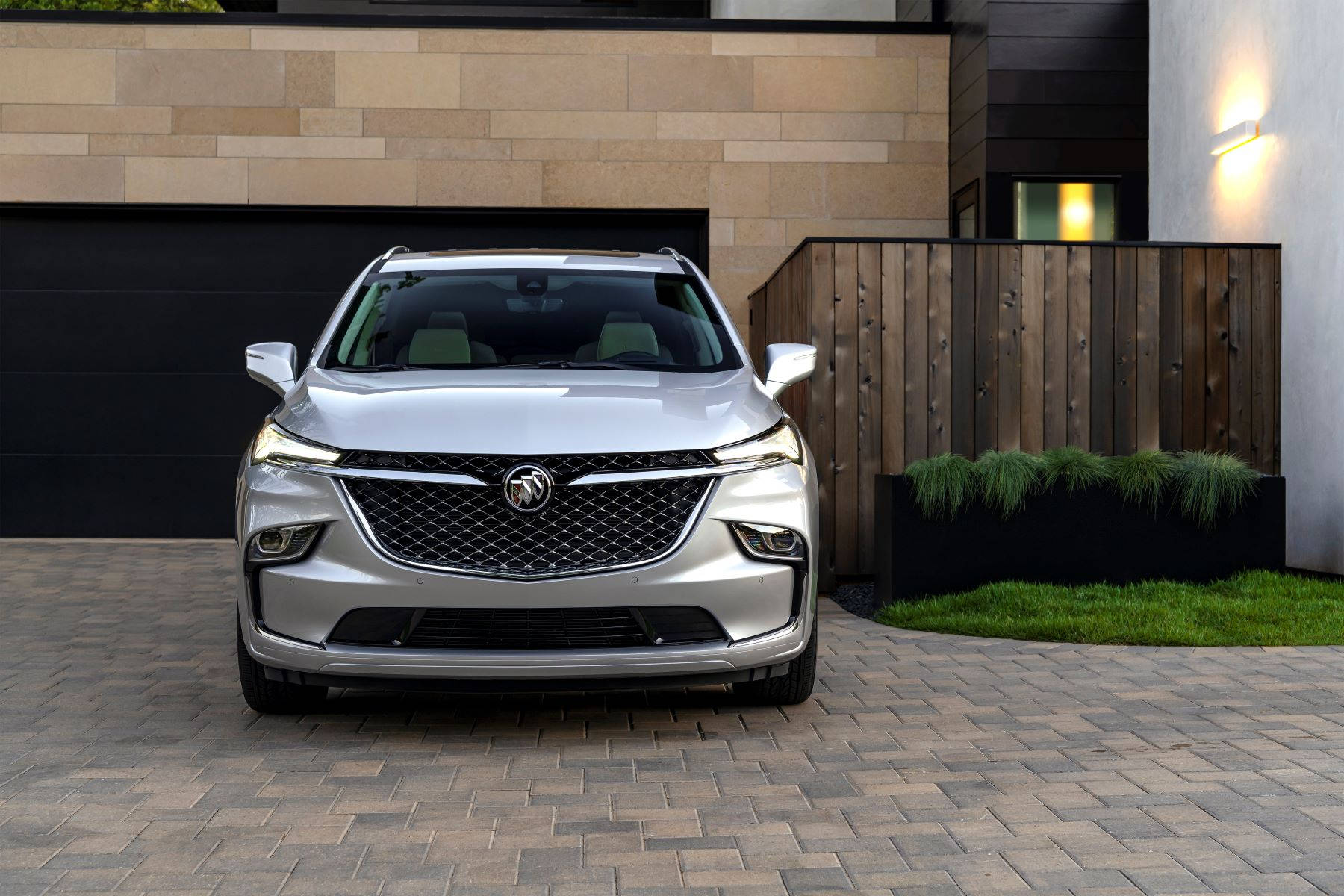 Buick Enclave At A Home Garage Background