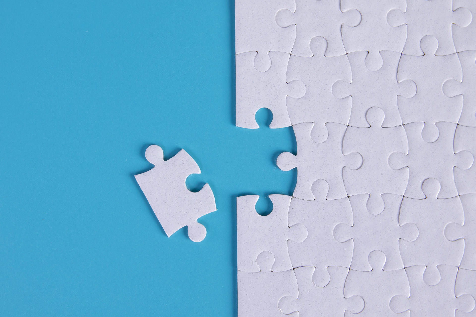 Building A Puzzle Blue And White Background
