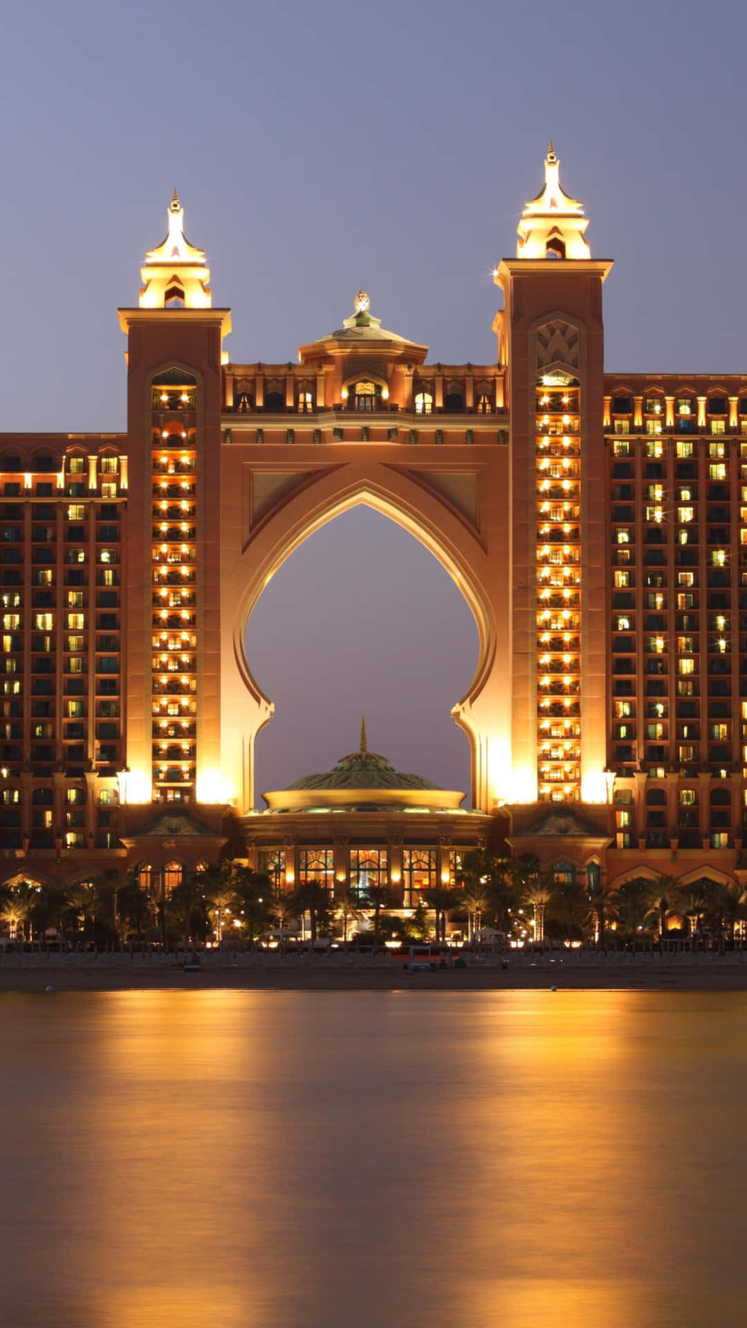 Buildings In Atlantis Resort With Lights Background