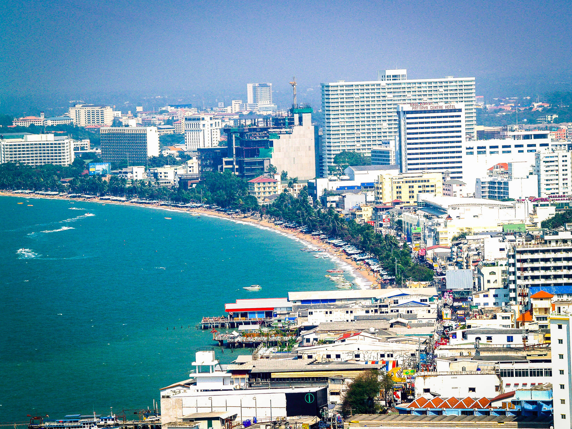 Buildings In Pattaya City Near Ocean Background