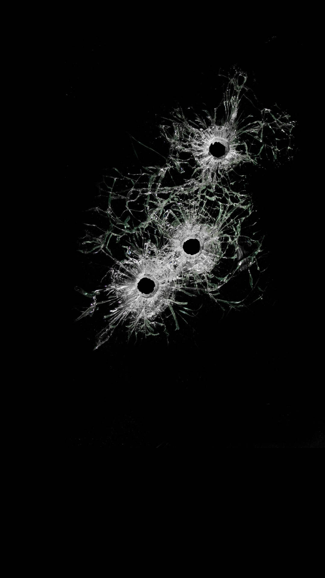 Bullet Holes On Broken Glass Background