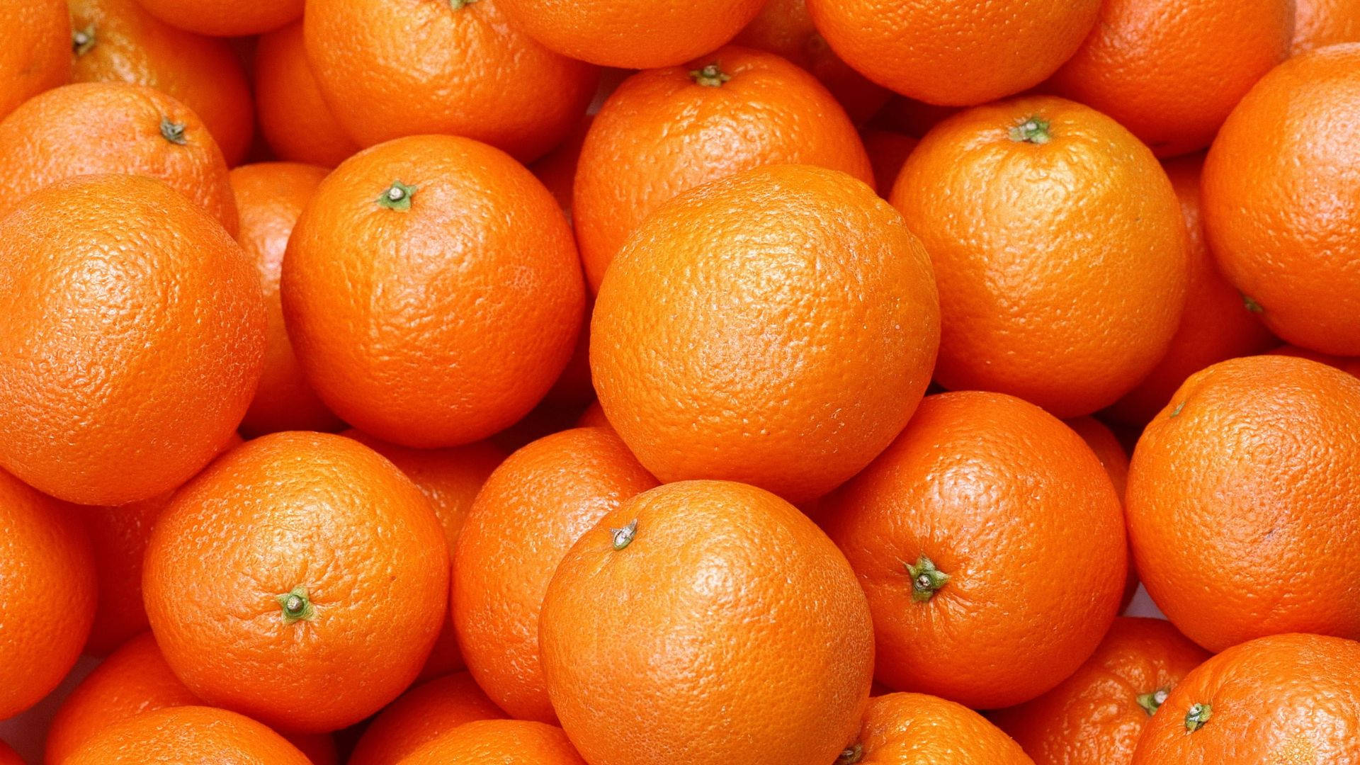 Bunch Of Orange Fruits Background