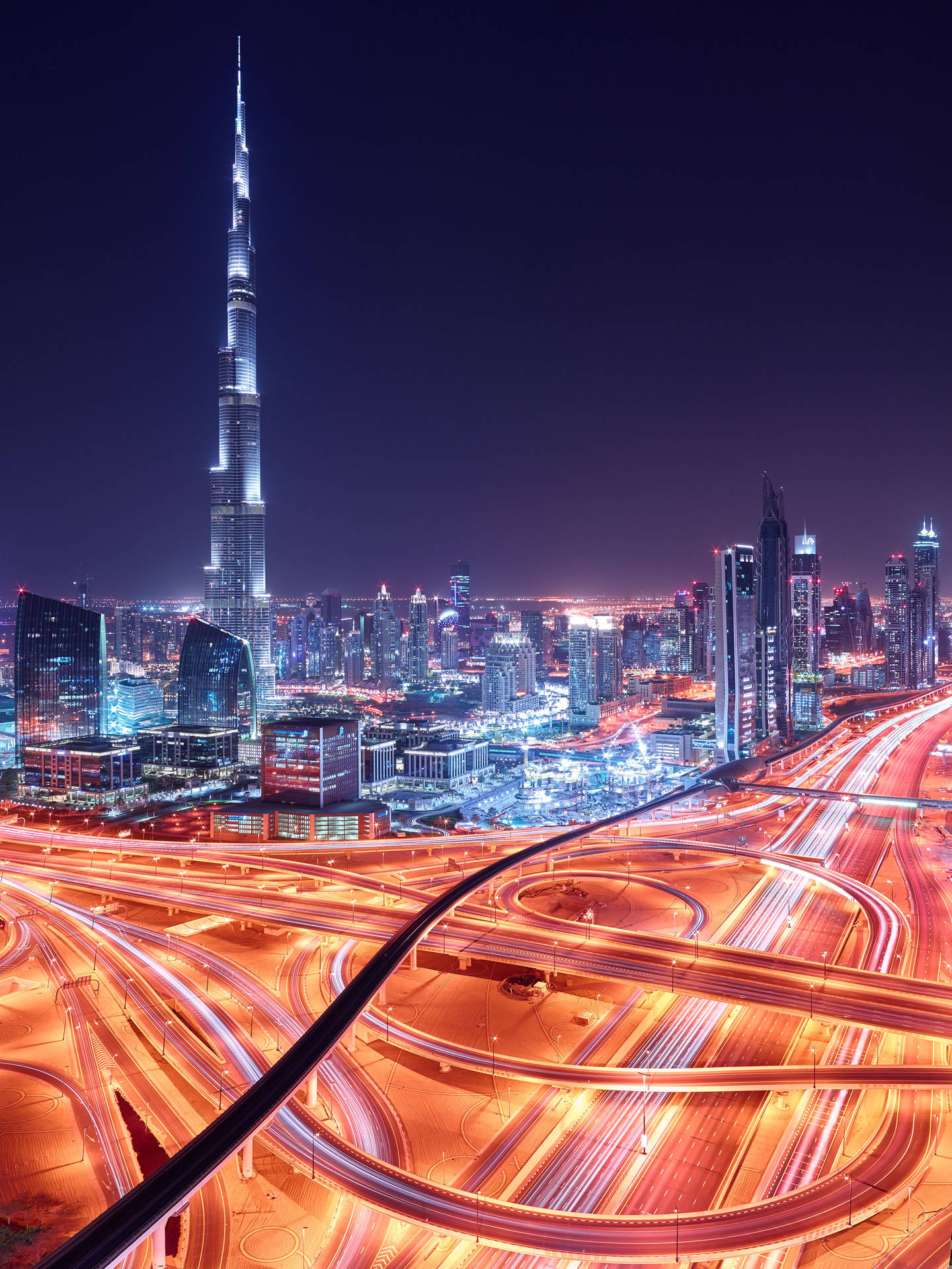 Burj Khalifa Tower In Dubai City At Night Background