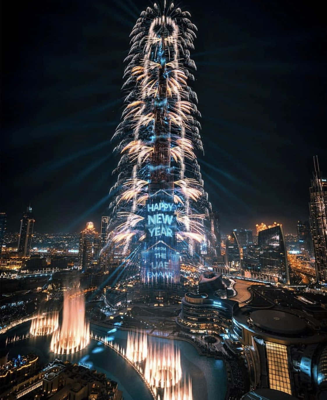 Burj Khalifa Tower In Dubai With Fireworks Background