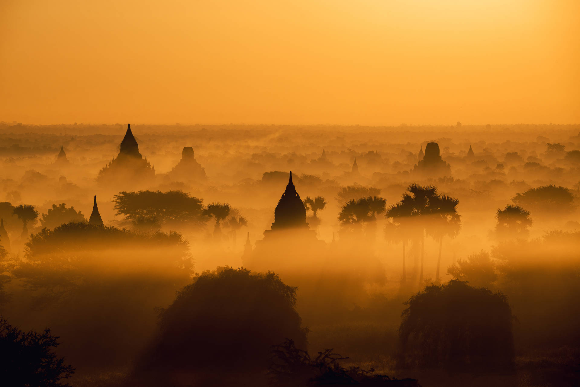 Burma Pagoda Spires Sunset Background