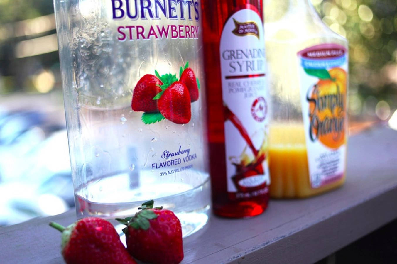 Burnett’s Strawberry Vodka With A Splash Of Grenadine And Orange Juice Cocktail