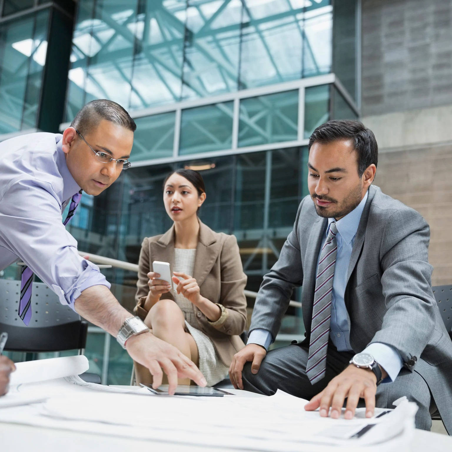 Business Partners In Discussion At Enterprise Meeting