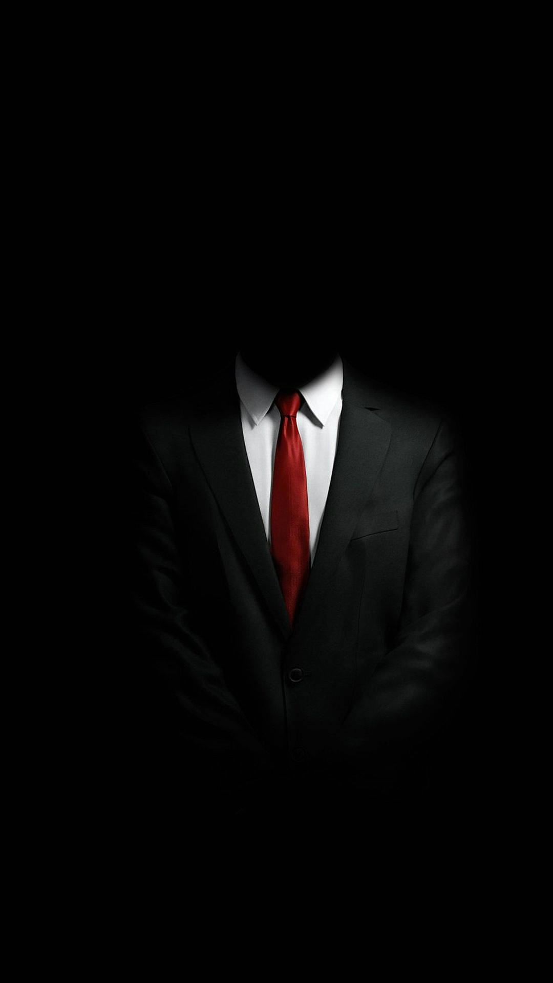 Businessman Using Mobile Phone In Dark Setting Background