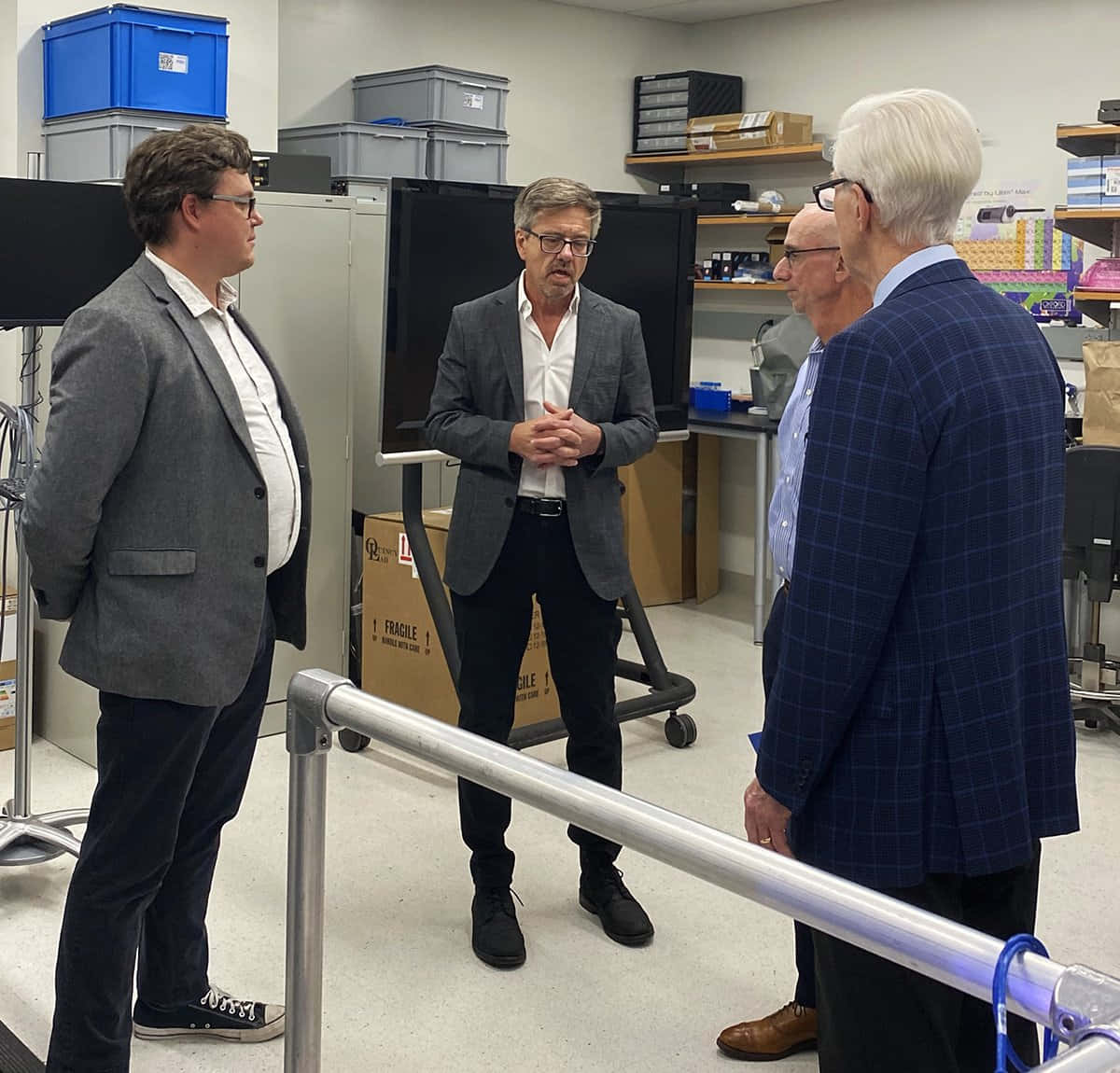 Businessmen Conversationin Lab Background