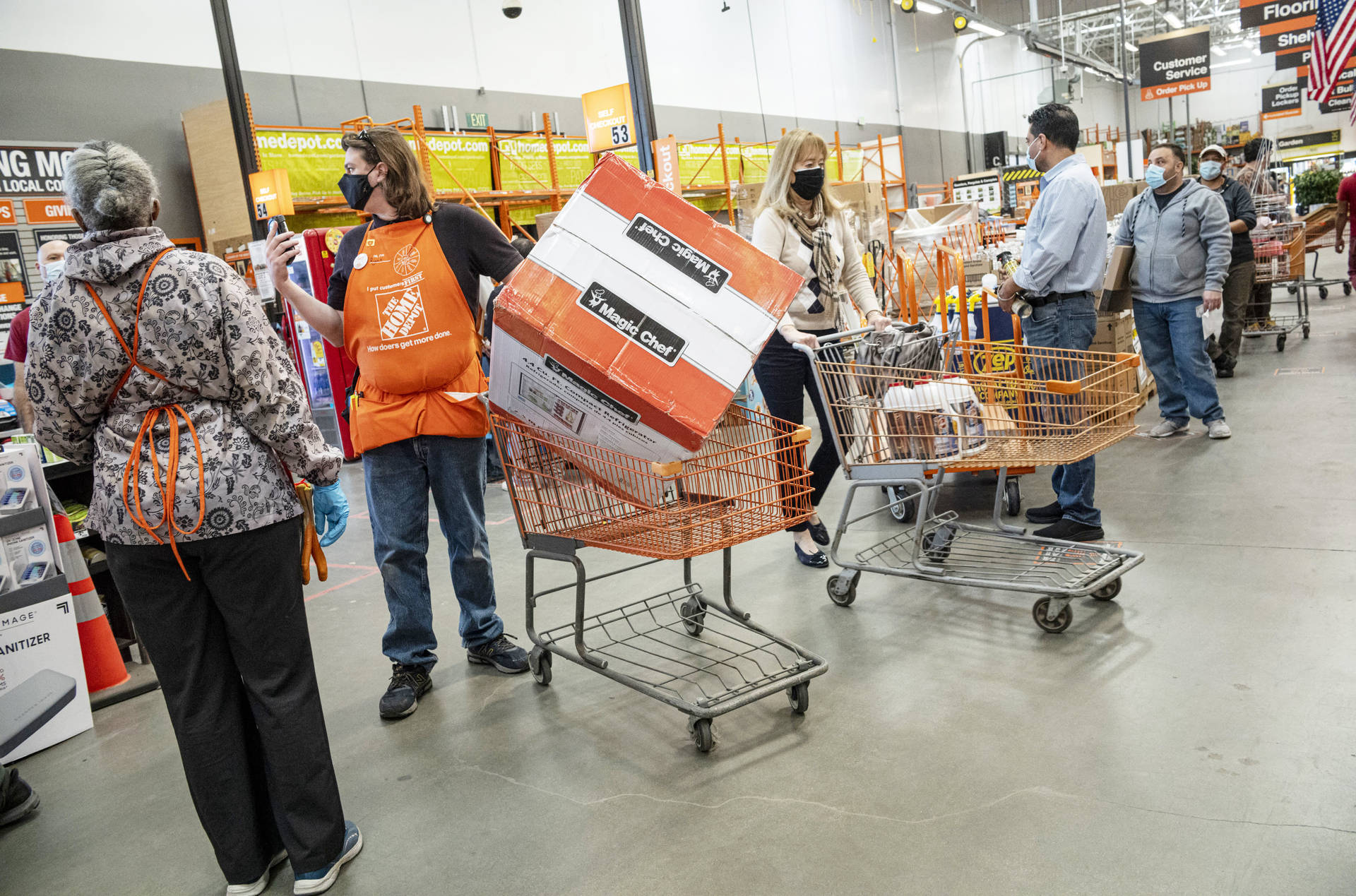 Bustling Checkout Counters At Home Depot Background