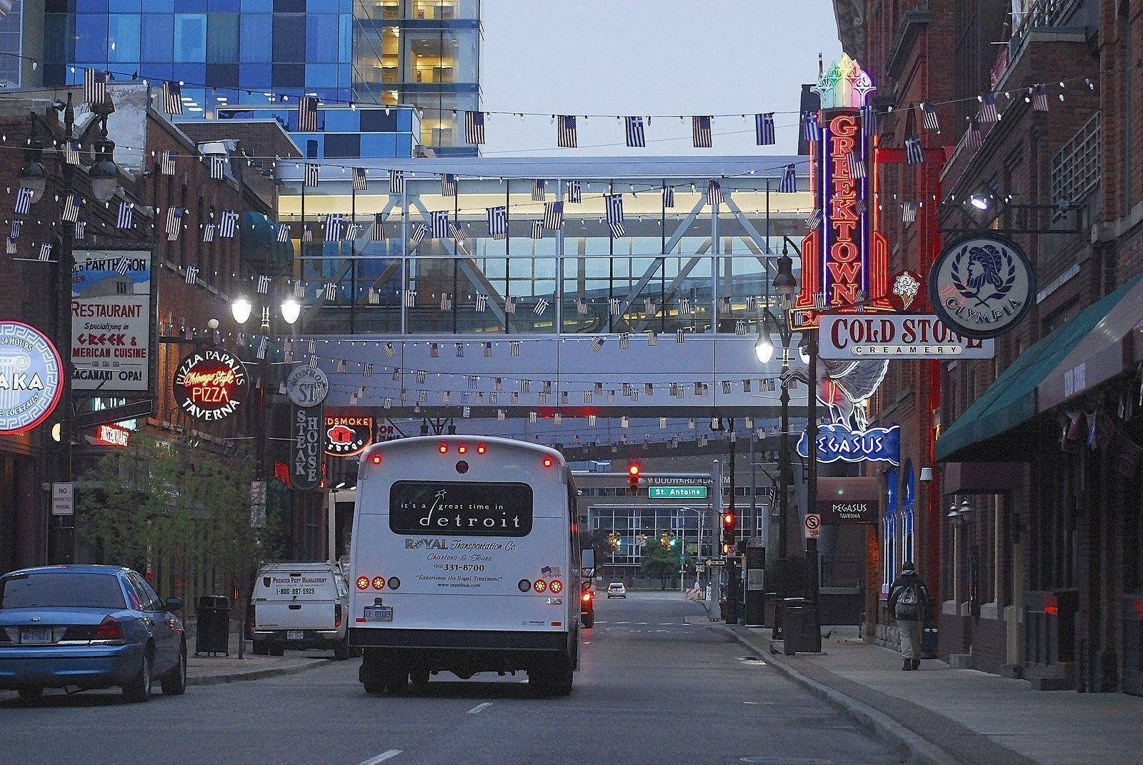 Bustling City Life In Detroit Greektown Background