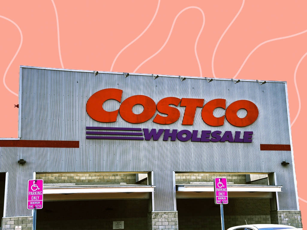 Bustling Costco Store Against Vivid Orange Backdrop Background