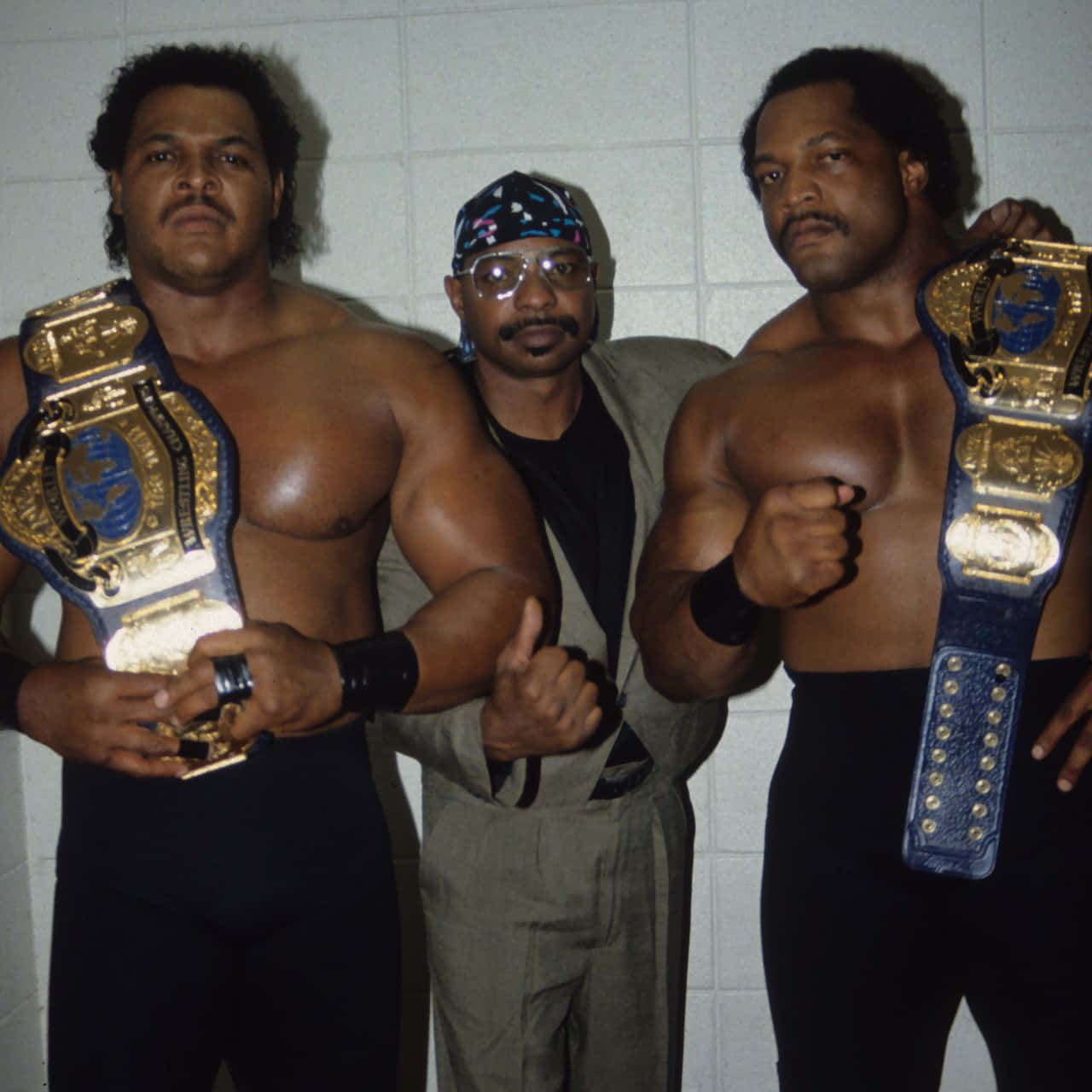 Butch Reed Holding Belt Background