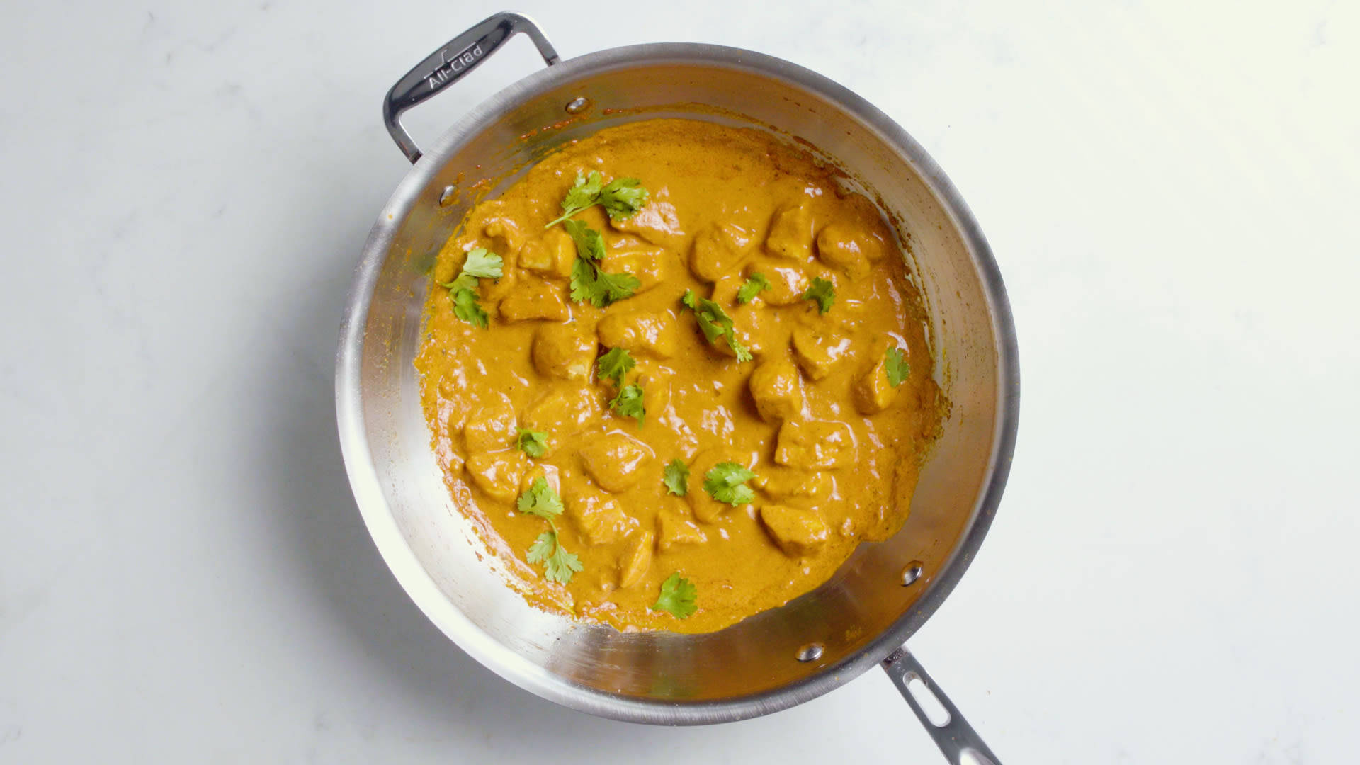 Butter Chicken In Silver Pot Background