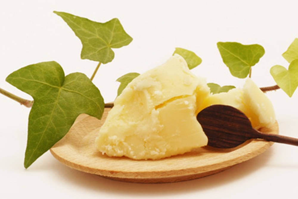 Butter On Wooden Plate With Leaves