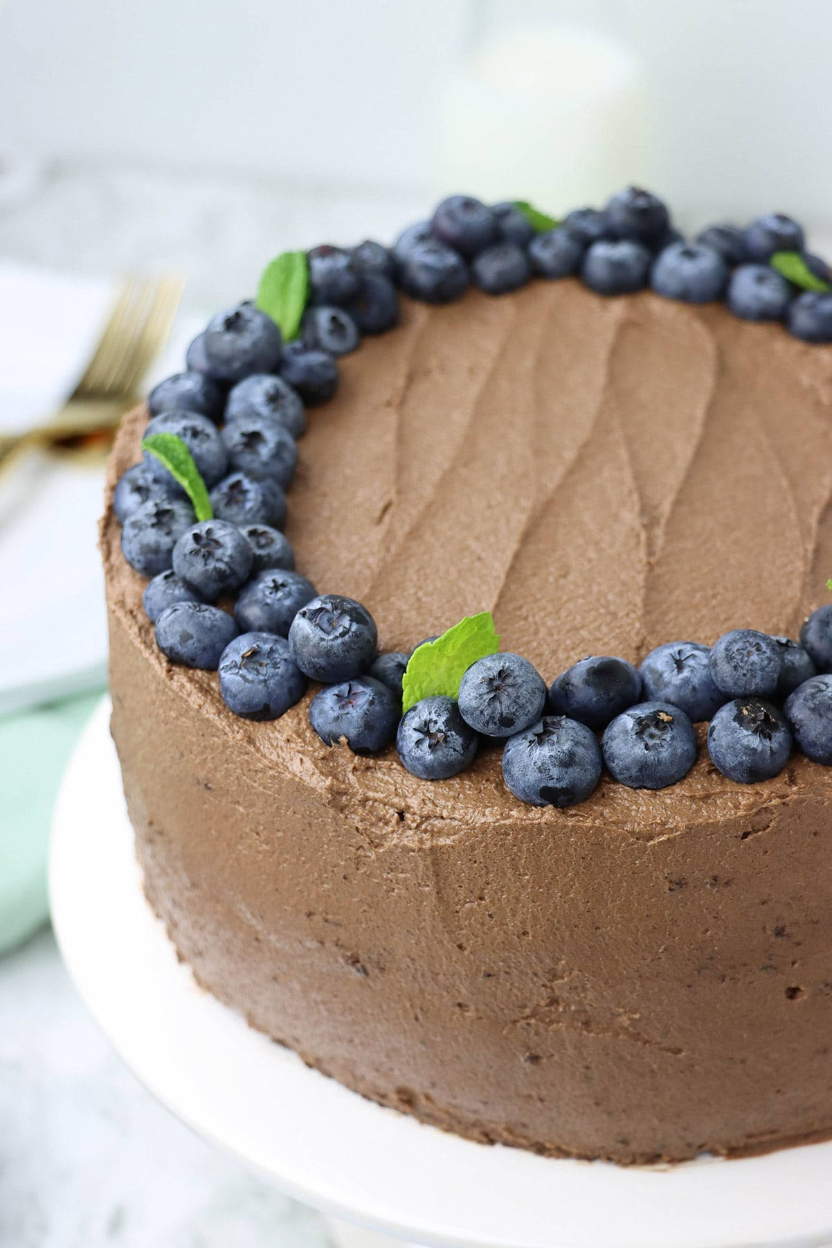 Buttercream Chocolate Cake With Blueberries Background