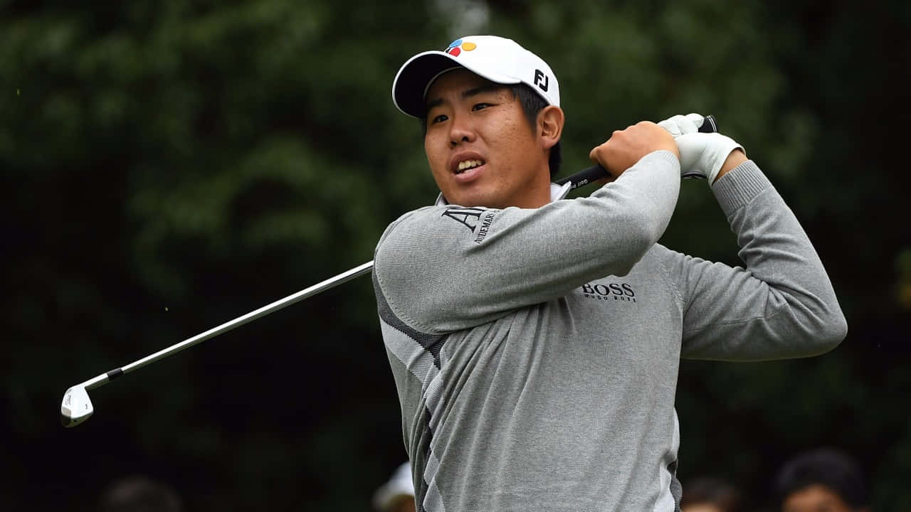Byeong Hun An Wearing Gray Long-sleeved Polo Shirt Background
