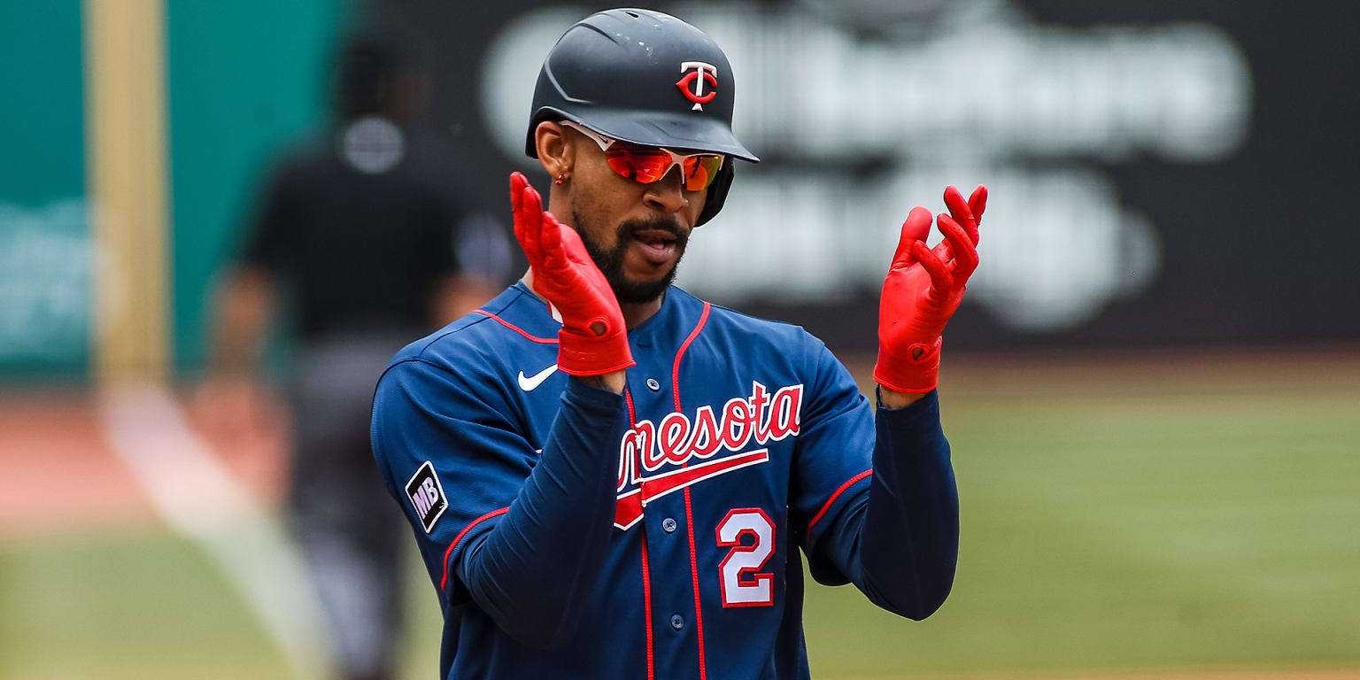 Byron Buxton Wearing Red Gloves