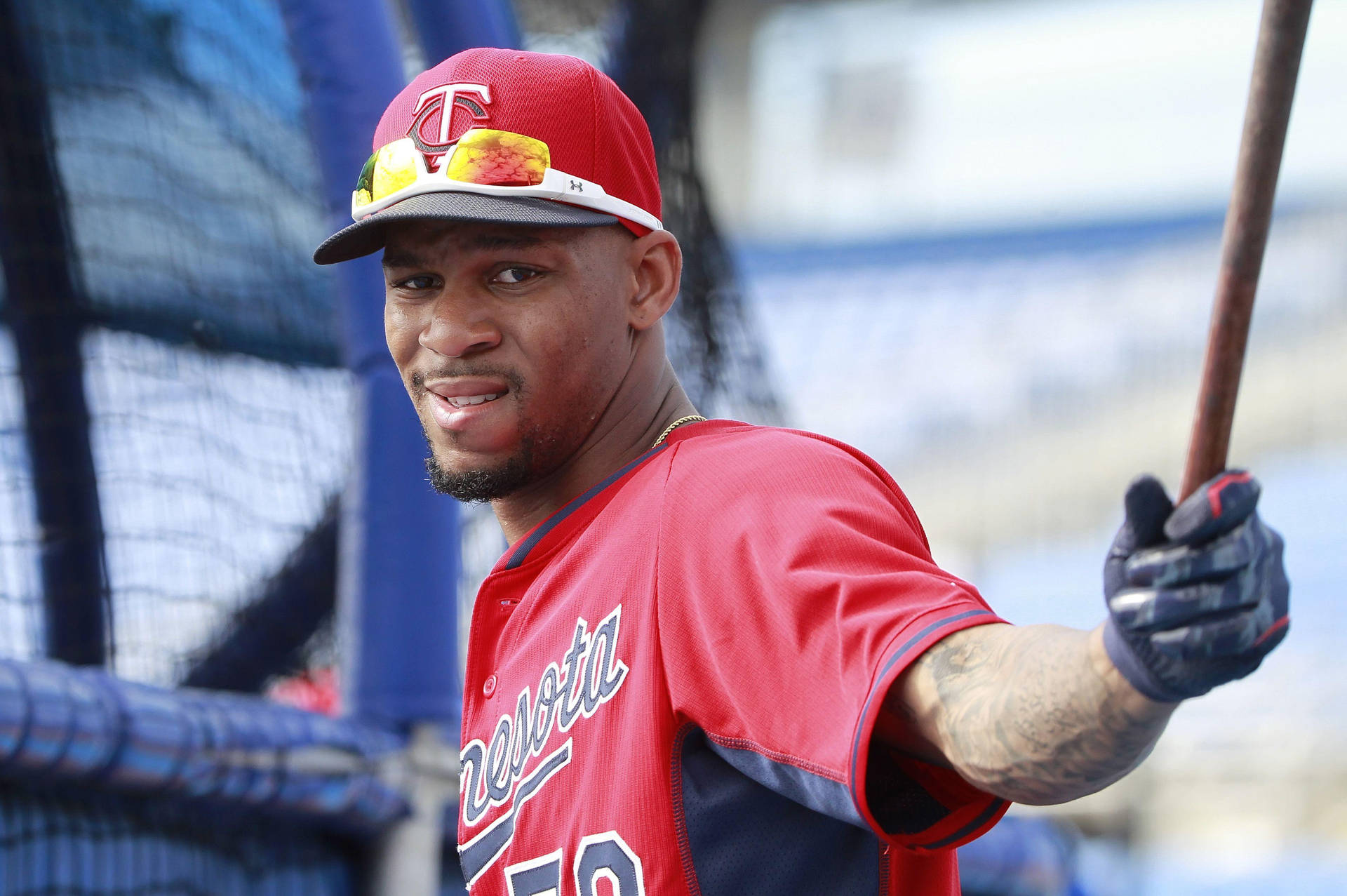 Byron Buxton With Sunglasses On Hat Background