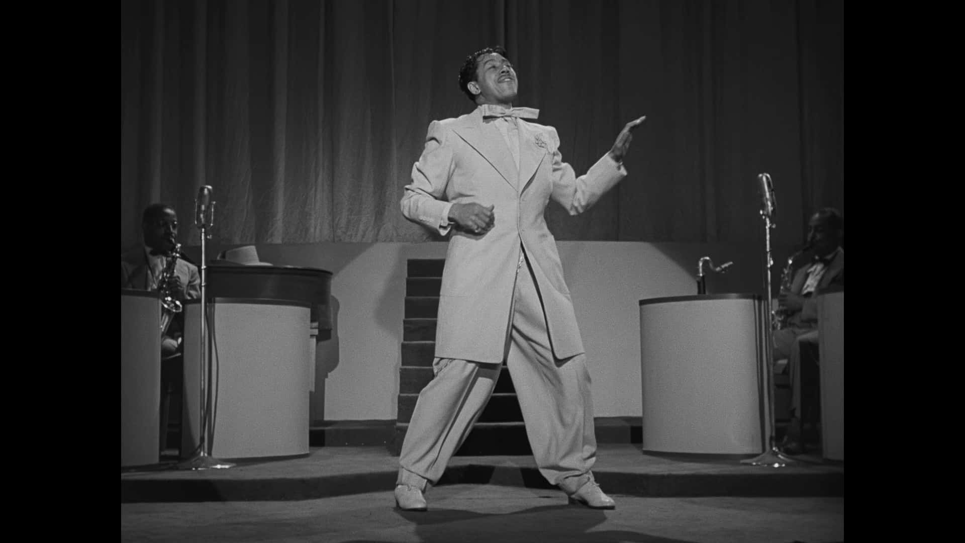 Cab Calloway Performingin White Suit Background