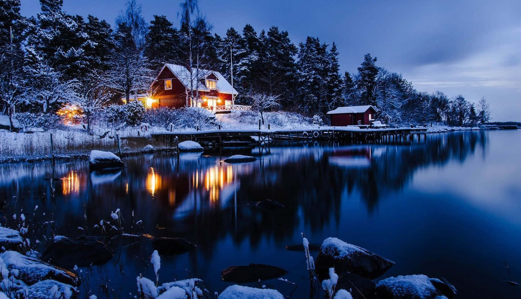 Cabin Beside A Freezing River Background