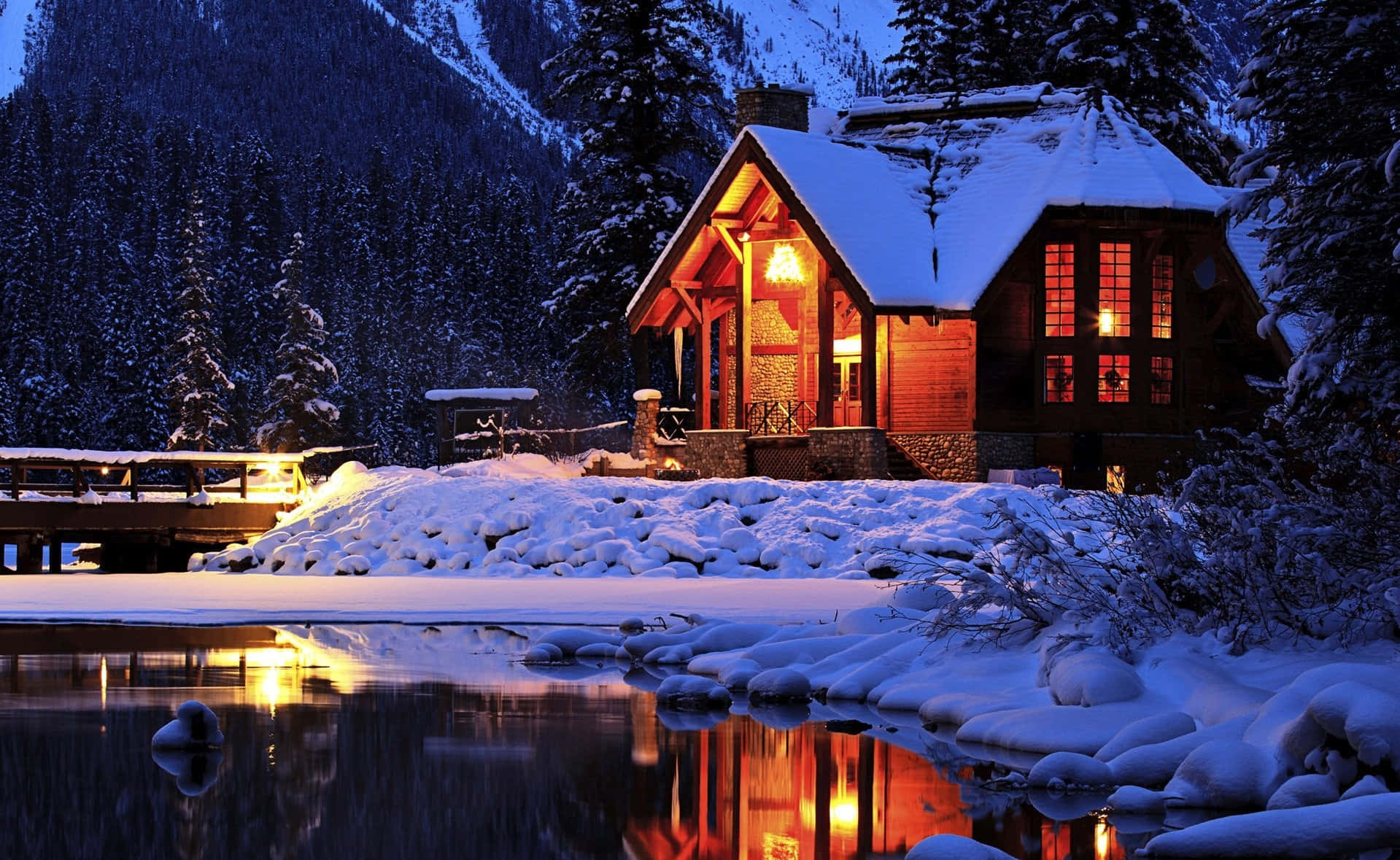 Cabin Covered In Snow At Night