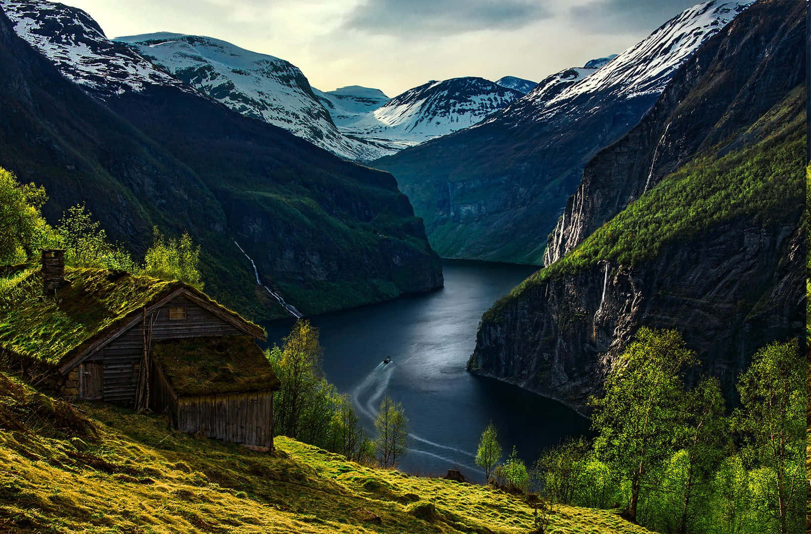 Cabin On A Hill Overlooking A River Background