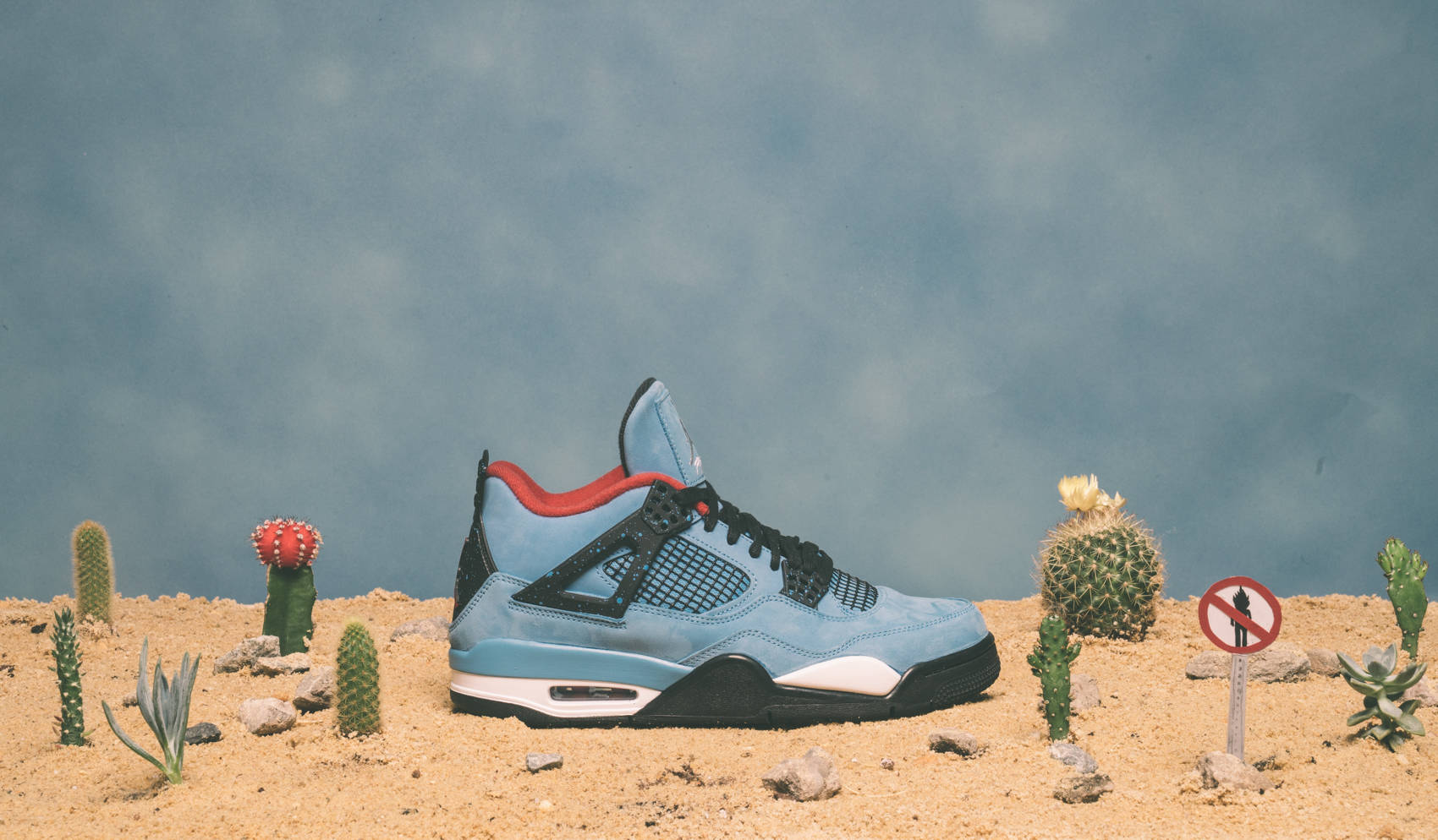 Cactus Jack Travis Scott Jordan 4 With Cactuses Background