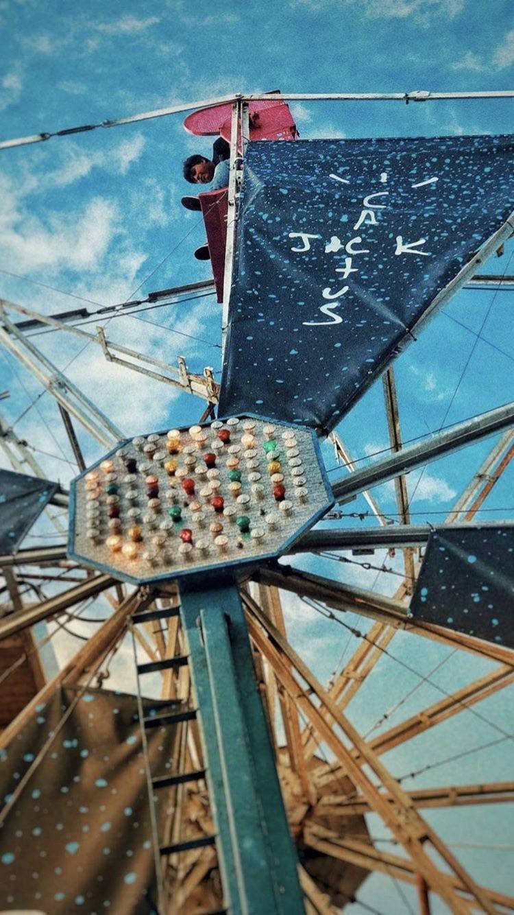 Cactus Jack Travis Scott Logo On Ferris Wheel Background