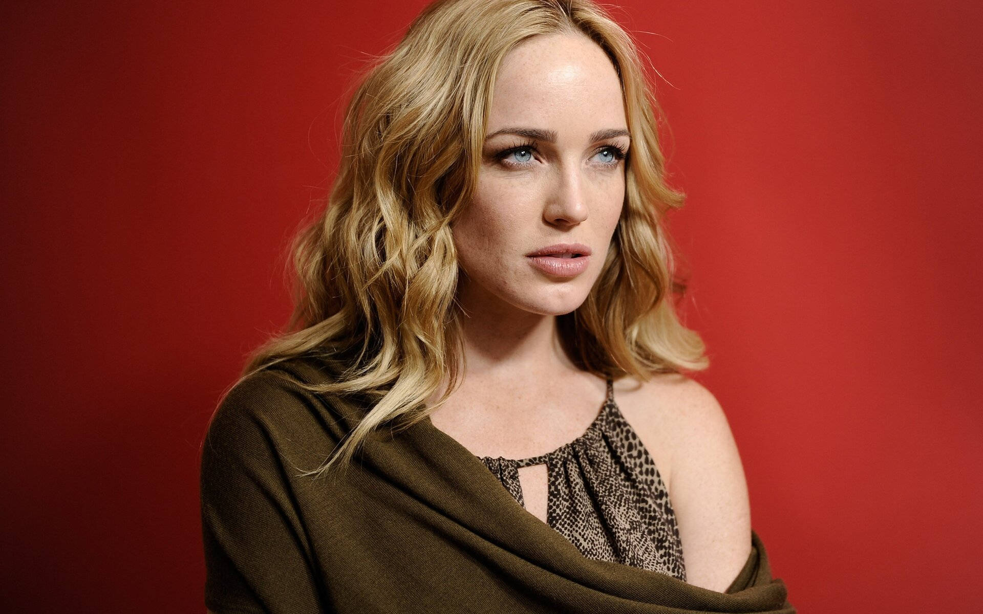 Caity Lotz Brown Outfit Background