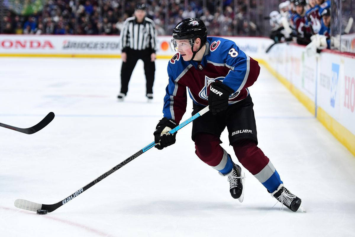 Cale Makar Attacking On The Ice Background