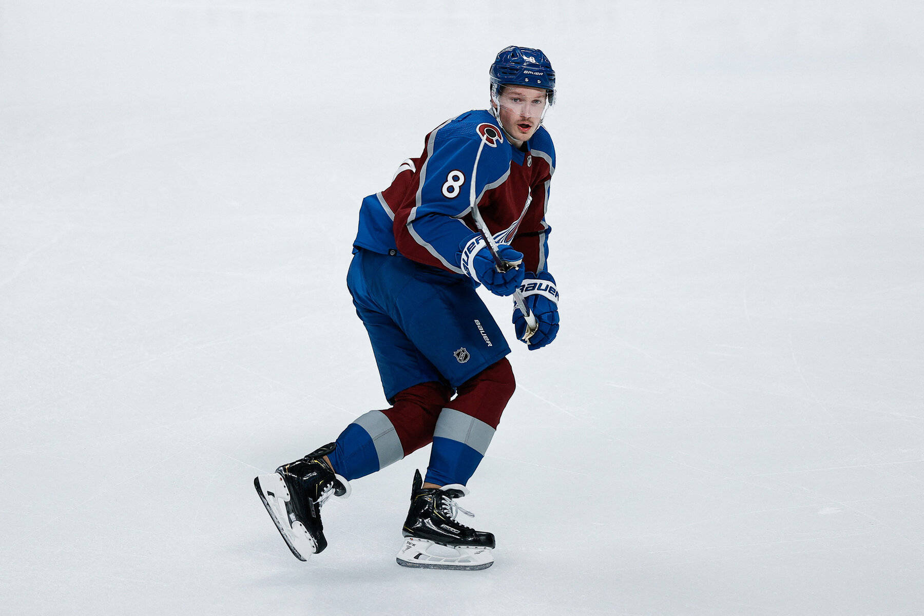 Cale Makar In Action With Colorado Avalanche Background