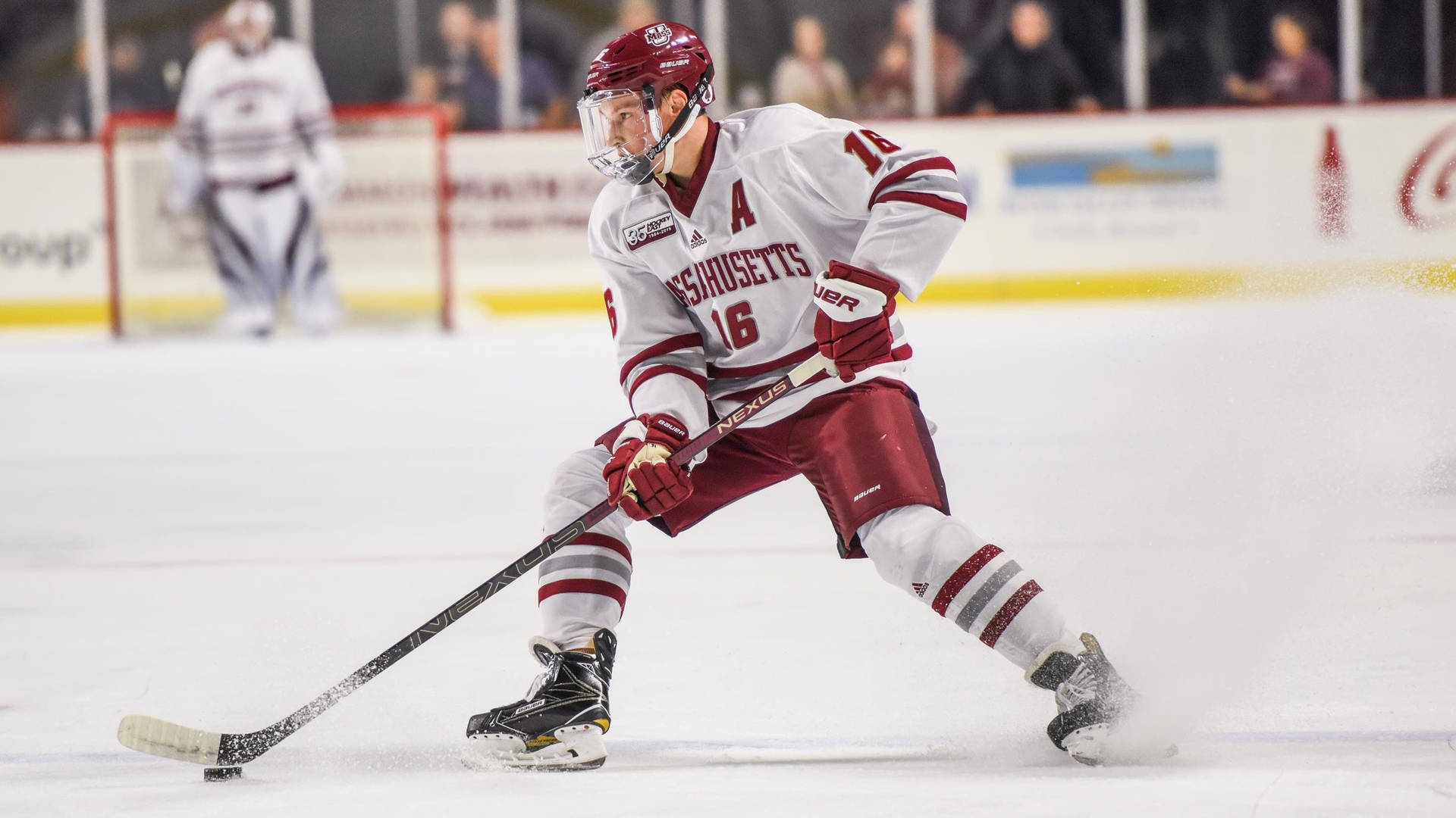 Cale Makar University Of Massachusetts Handling Puck Background