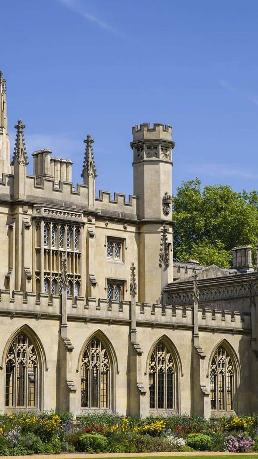 Cambridge University Building In Blue Sky Background