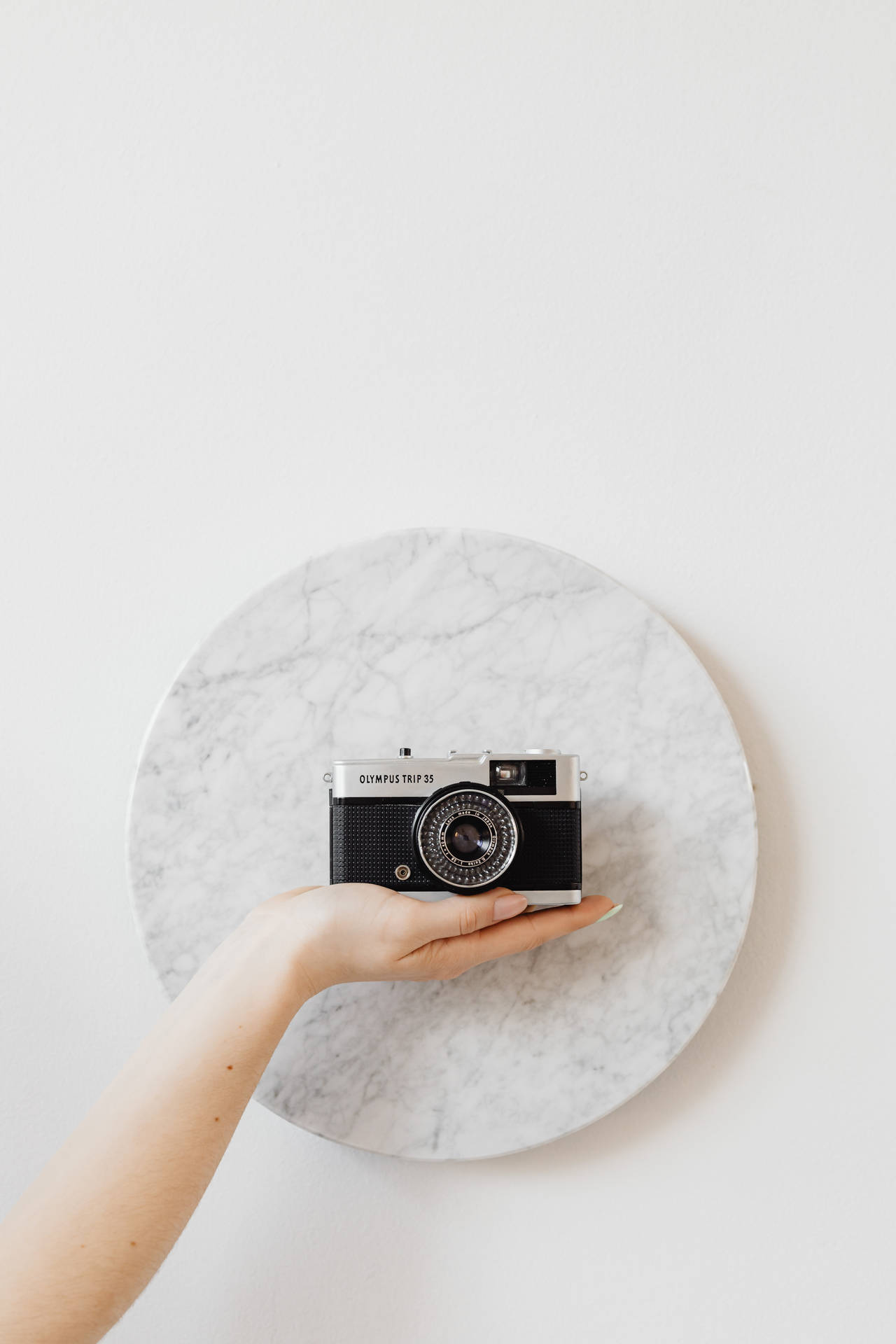 Camera On Round Marble