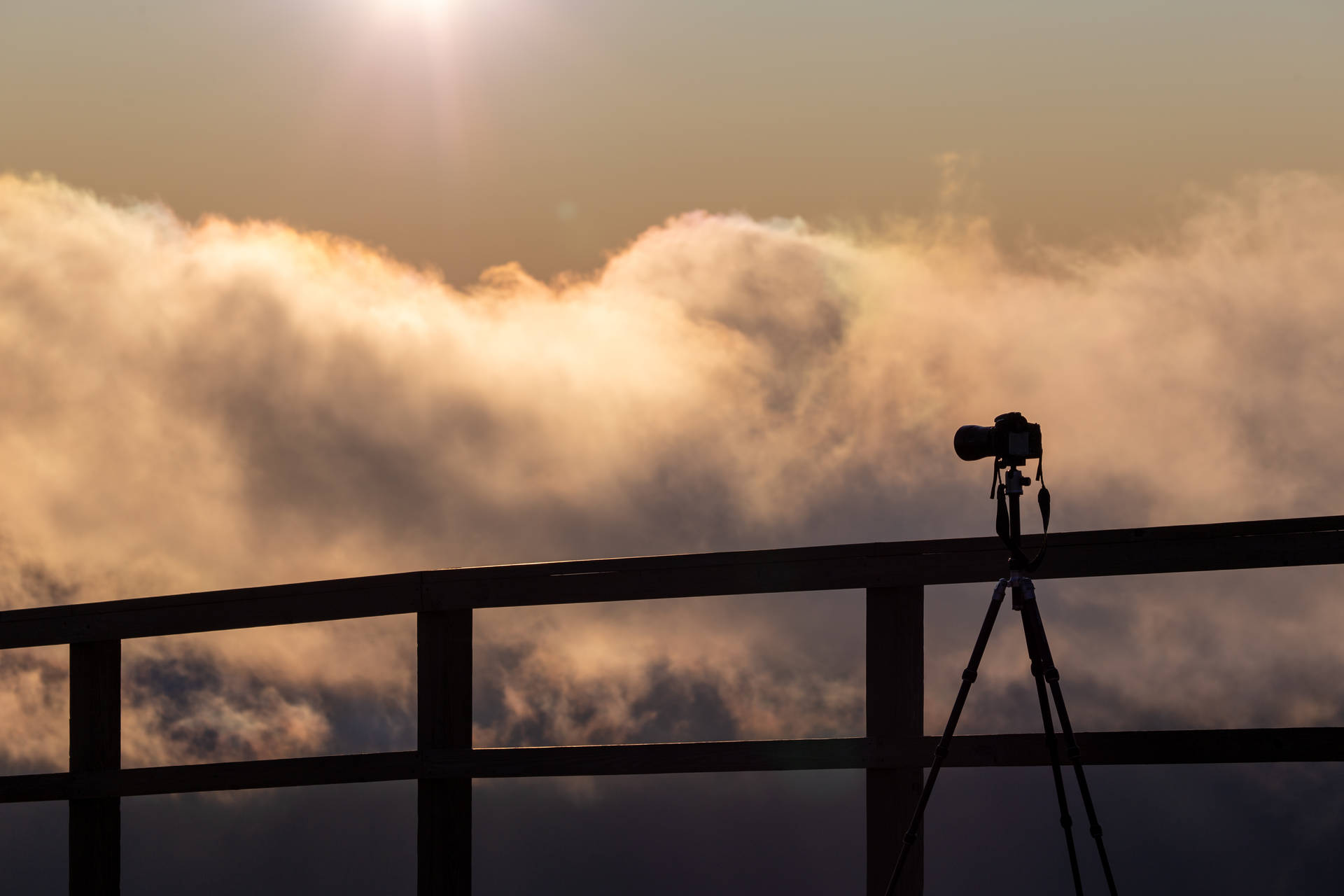 Camera With Clouds Background