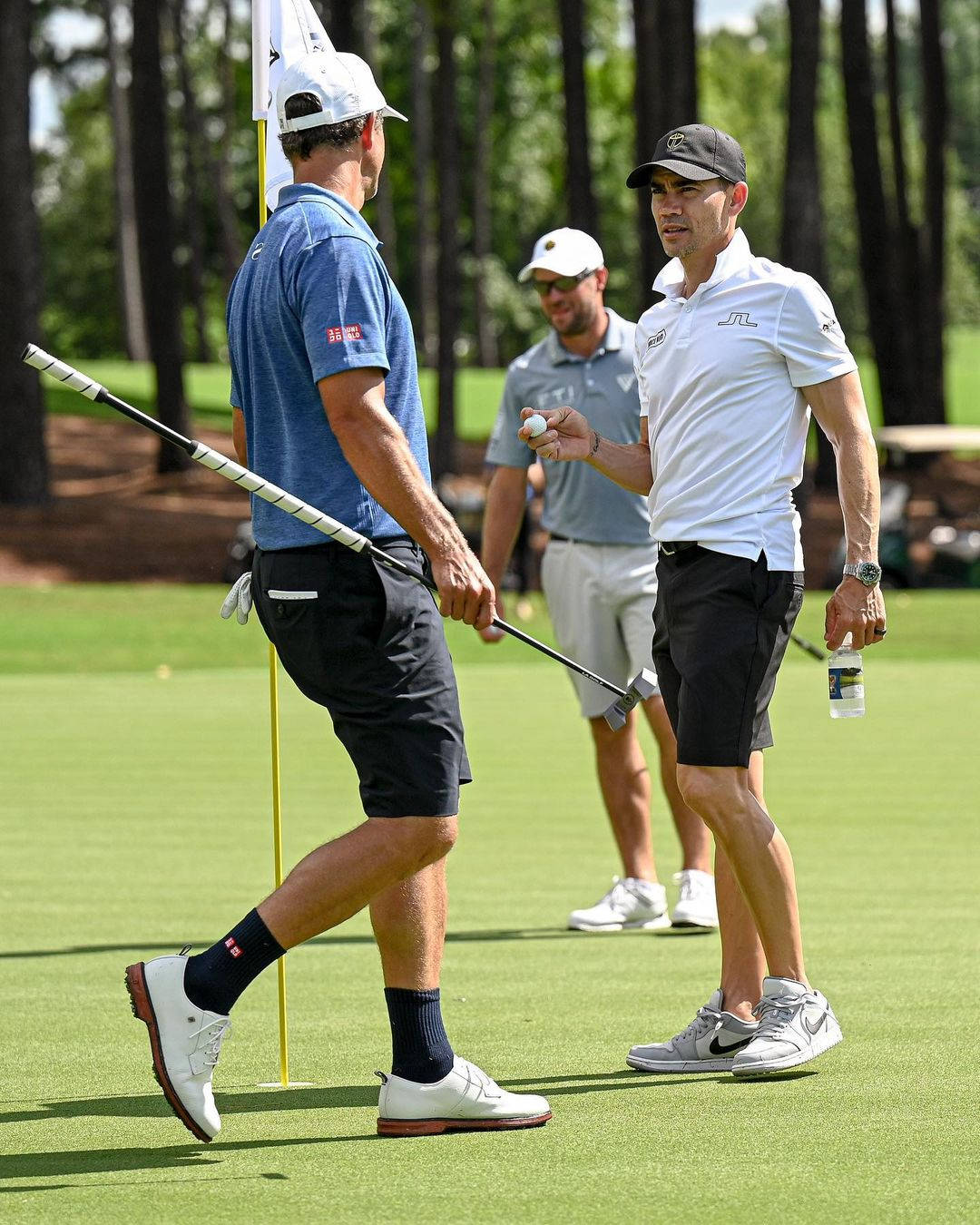 Camilo Villegas Holding Bottle Of Water