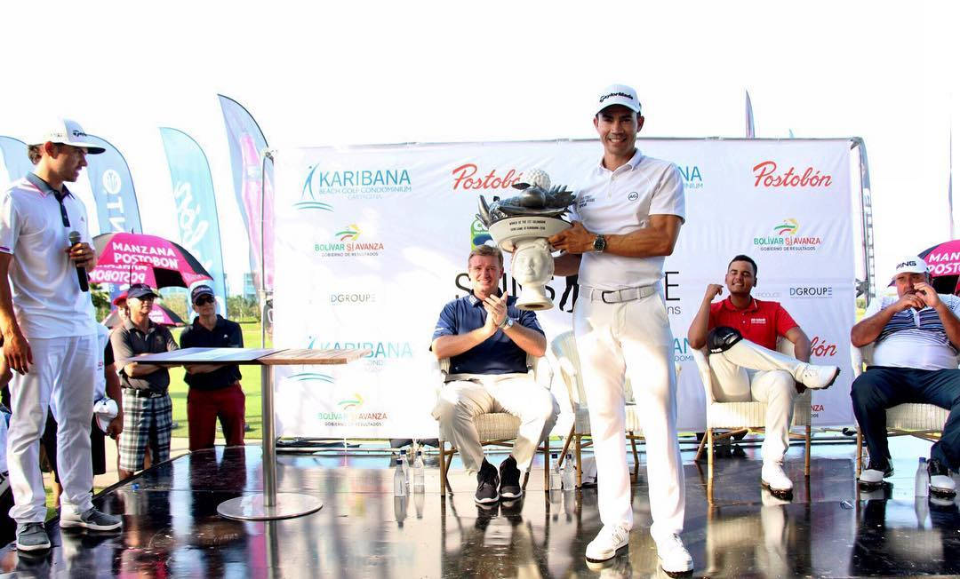 Camilo Villegas Receiving A Trophy