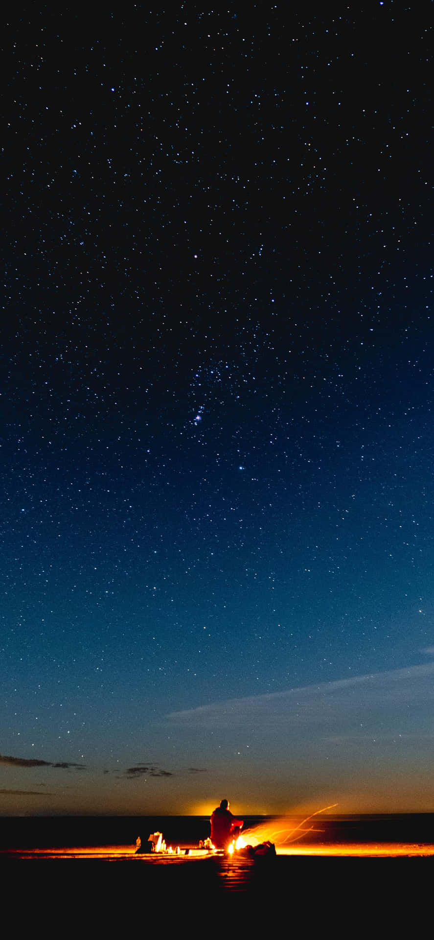 Campfire Starry Night At Beach Background