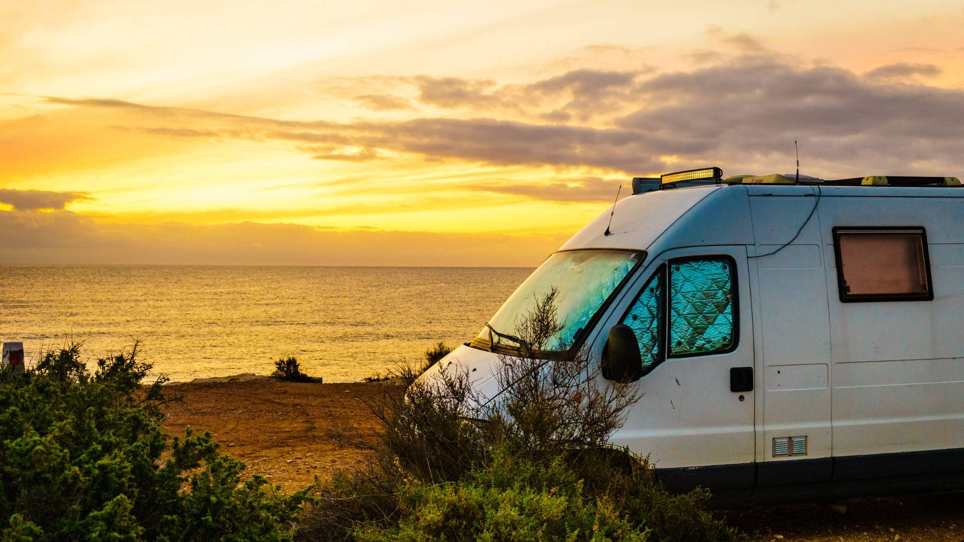 Camping Van On The Beach Background