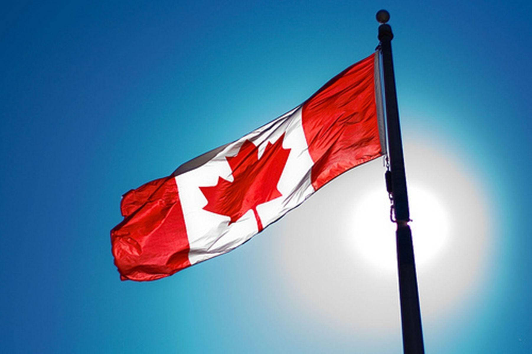 Canada Flag With Sunlight Background