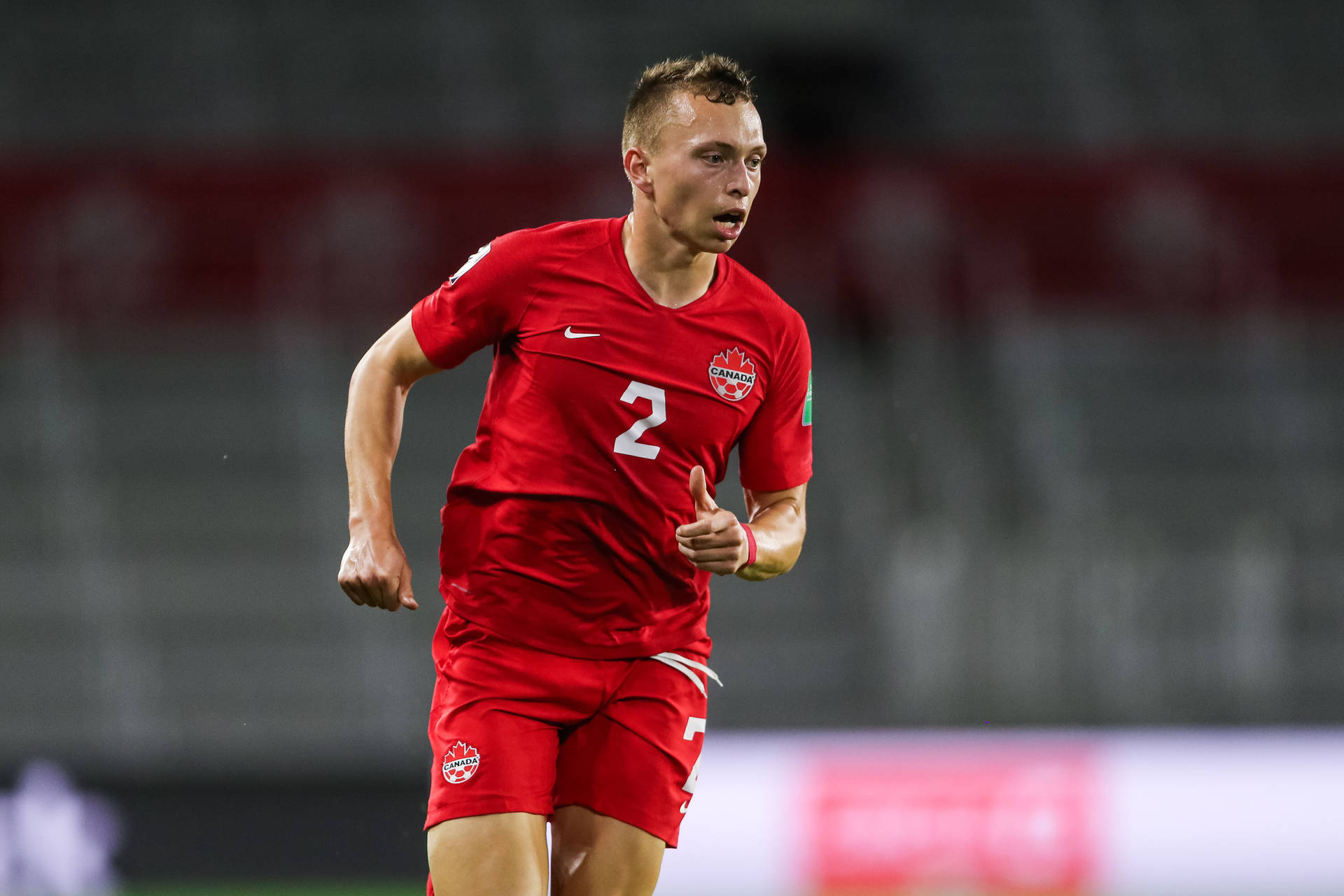 Canada's National Football Team In Action Background